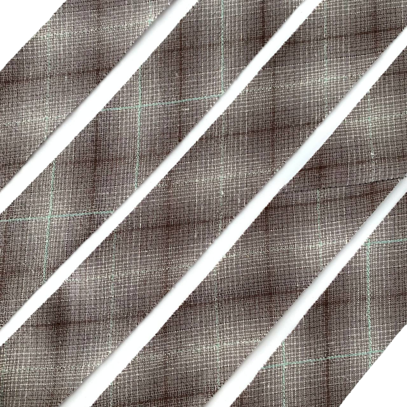 Фото Косая бейка из фактурного хлопка темно-серый градиент с бирюзовой нитью 2